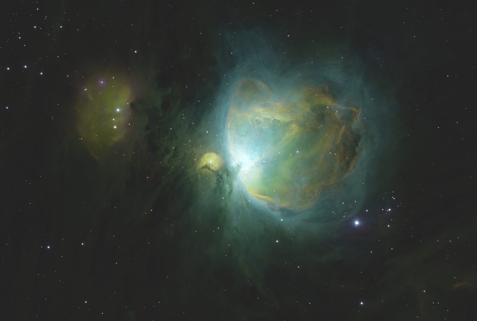 A bright, greenish, crab-shaped nebula