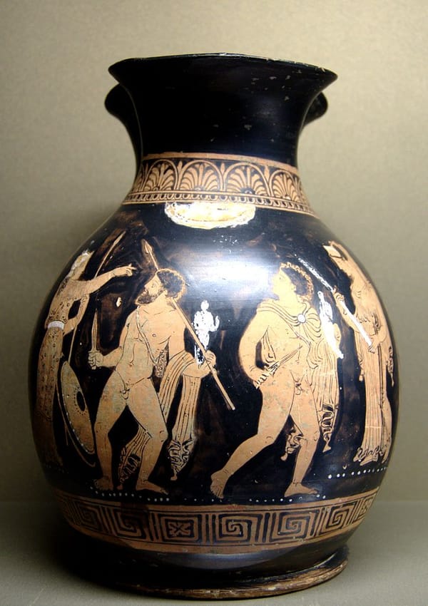 Photo of an ancient vase with images of two Greek warriors stealing a statue