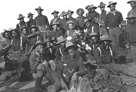 Black-and-white photo of a group of African-American cavalrymen