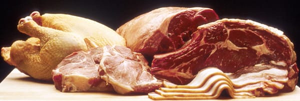 Photo of various meats (beef, pork, chicken) on a table