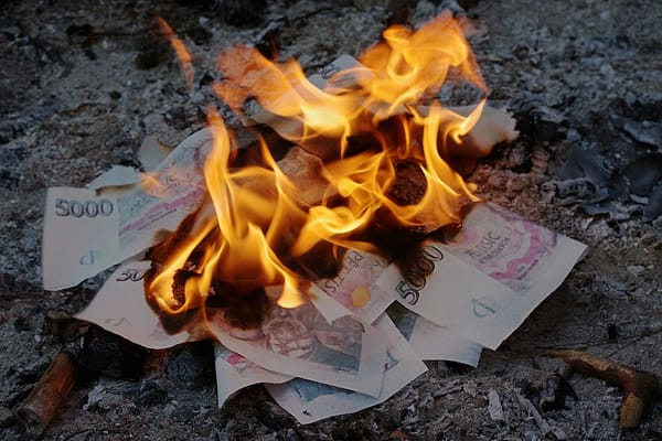 Photo of Czech banknotes on fire